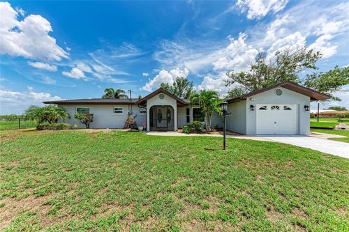 3376 Peace River Dr, PUNTA GORDA, FL, 33983-3424 | Card Image