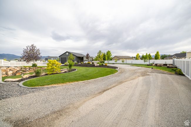 View of asphalt road with a residential view | Image 73