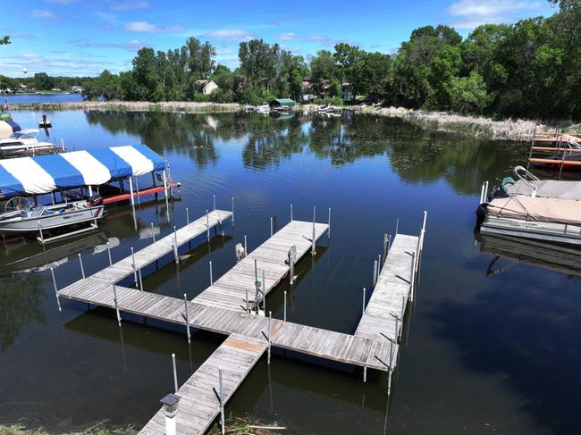 Fall picture of permanent docks with lifts on both docks | Image 51
