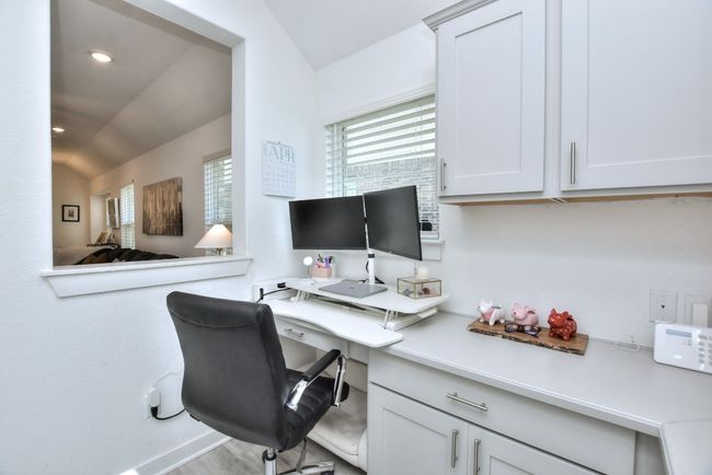 Office featuring recessed lighting and lofted ceiling | Image 6