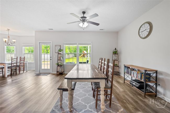 A 15 lite door leads to the back yard. | Image 9
