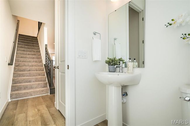 Bathroom with wood finished floors | Image 20