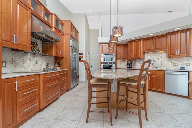 High end SS appliances, new GE monogram refrigerator, kitchen r.o., induction 6 burner cooktop | Image 12