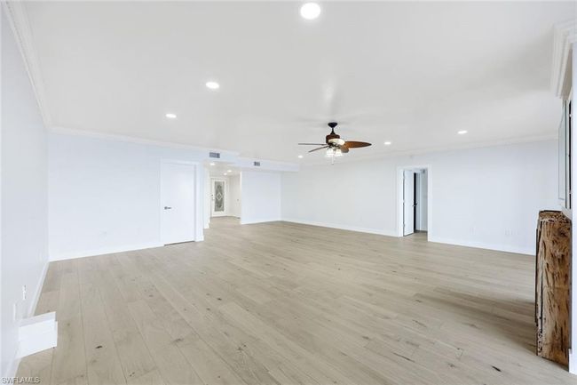 Looking toward dining, kitchen and foyer | Image 18