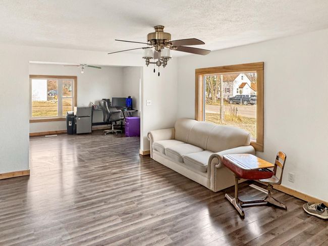 Large living area with updated windows | Image 7