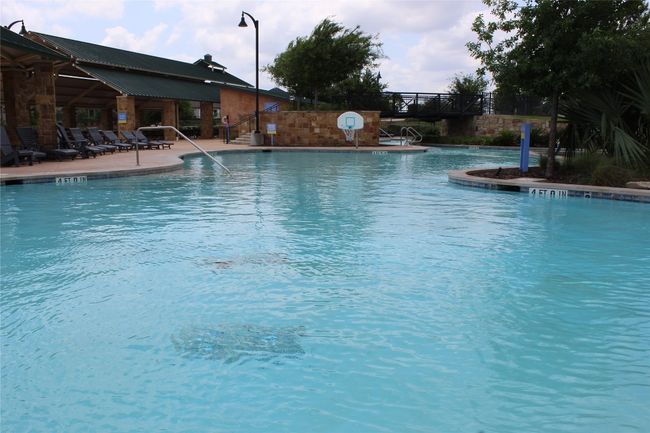 Community pool featuring a patio | Image 26