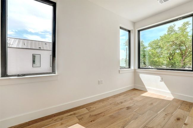Unfurnished room featuring light wood-style flooring and baseboards | Image 18
