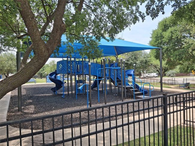 Community play area with fence | Image 24