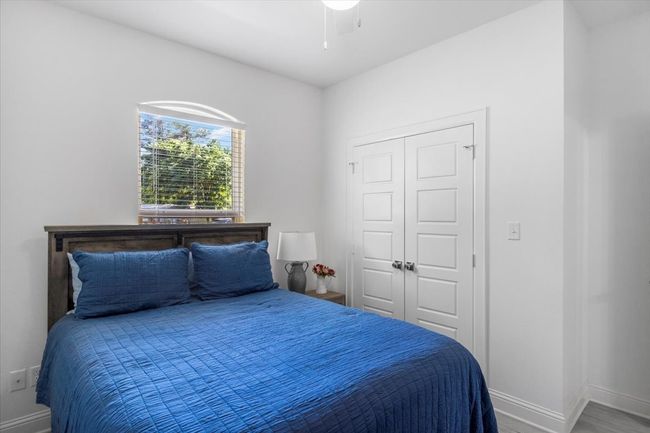 Bedroom featuring a closet and baseboards | Image 28