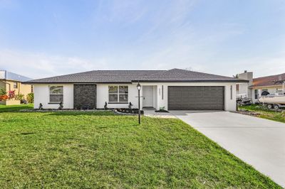 6043 Birnam Wood Ln, House other with 3 bedrooms, 2 bathrooms and null parking in Fort Myers FL | Image 1