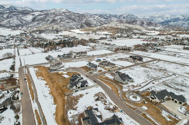 Snowy aerial view with a residential view and a mountain view | Image 62