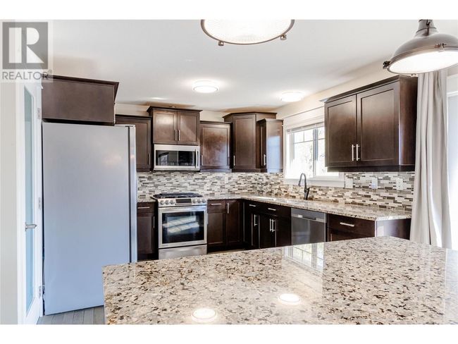 11885 Middleton Rd, House other with 5 bedrooms, 4 bathrooms and 3 parking in Lake Country BC | Image 5