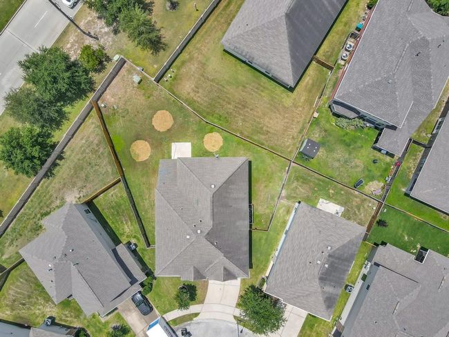 Larger back yard area can be seen from this aerial photo. | Image 42