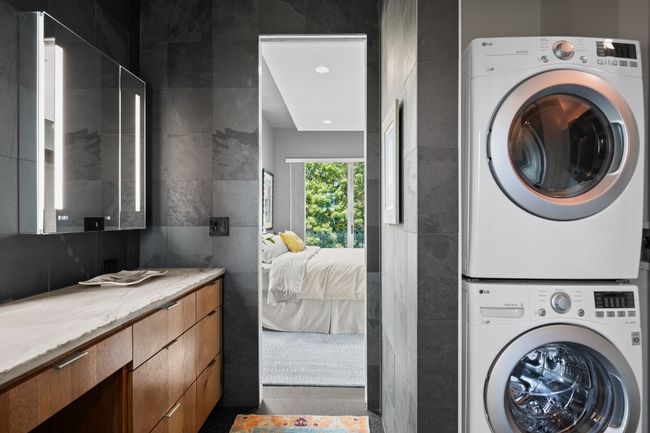 First laundry area, within the primary closet- no hauling laundry up and downstairs. | Image 19
