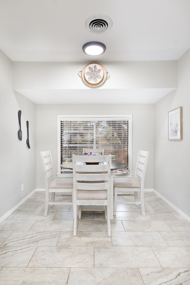 Dining space featuring visible vents and​​‌​​​​‌​​‌‌​‌‌​​​‌‌​​‌‌​‌​​​​​‌ baseboards | Image 13