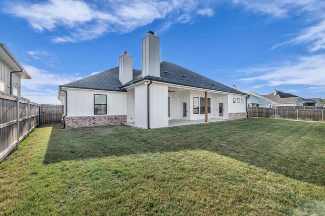 Back Yard has a privacy fence | Image 32