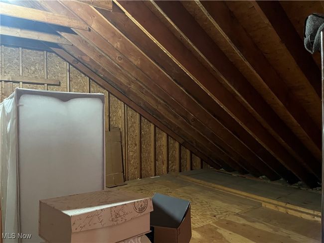 Unfinished Bonus Room Upstairs serves as a walk in Attic. | Image 34