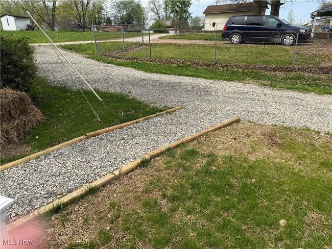 View of yard with fence | Image 24