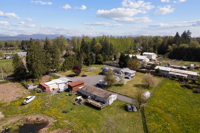 Birds eye view of property featuring a view of trees | Image 32