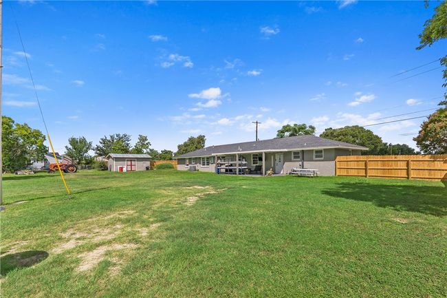 Rear view of house featuring an outdoor structure | Image 30