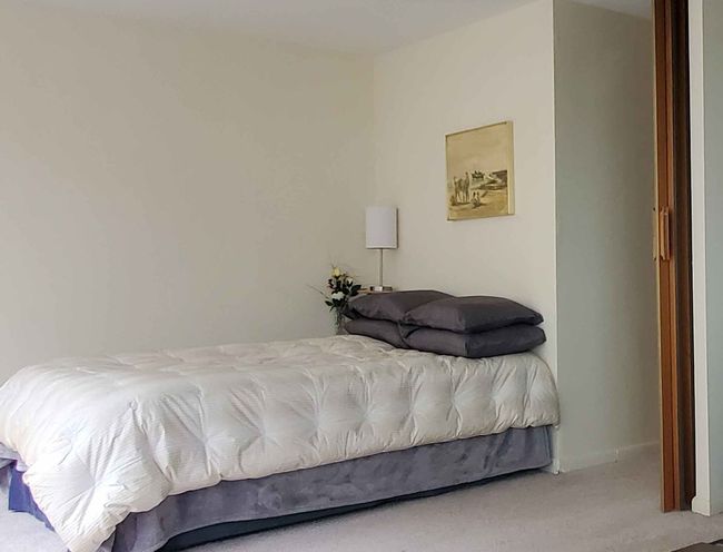 Divider between bedroom & living room fully open w | Image 15
