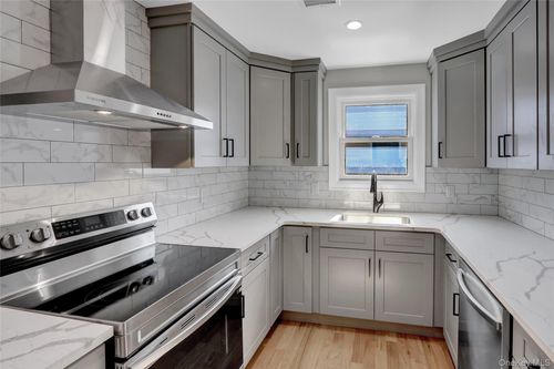 77 Carlls Path, North Babylon, NY, 11703-1729 | Card Image