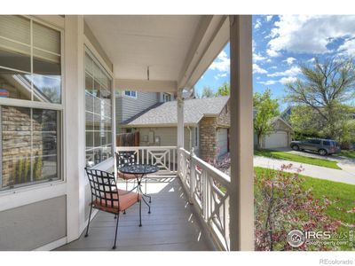 ENJOY MORNING COFFEE OR EVENING COCKTAILS ON THE LOVELY WEST FACING FRONT PORCH | Image 2