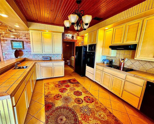 7165 Backridge Rd, House other with 6 bedrooms, 7 bathrooms and 2 parking in Sabine Pass TX | Image 31