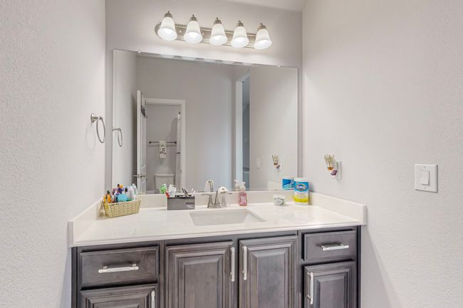 Bathroom with toilet and vanity | Image 23