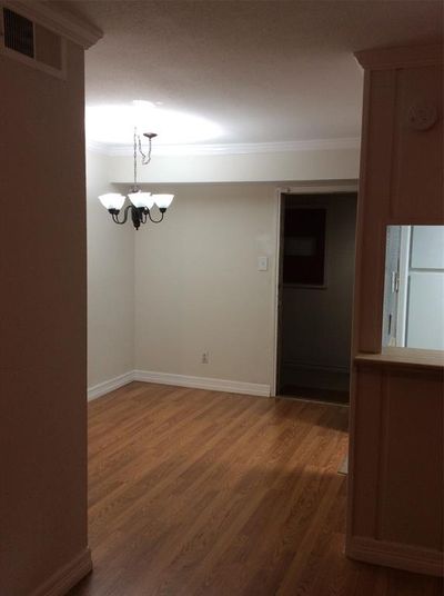 View of Dining from living. Notice window from kitchen on right. | Image 3