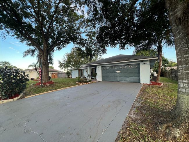1921 Sw Hickock Ter, House other with 3 bedrooms, 2 bathrooms and null parking in Port St. Lucie FL | Image 65