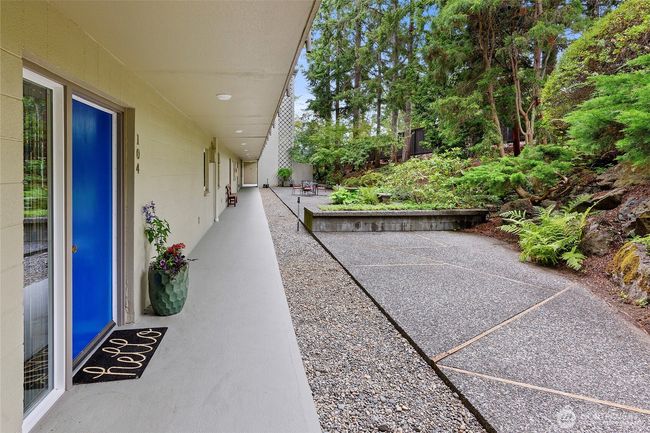 Gardens and common area at front of this condominium | Image 23