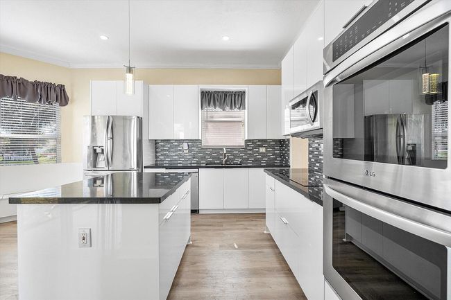 13214 Sw 21 St St, House other with 4 bedrooms, 3 bathrooms and null parking in Miramar FL | Image 13