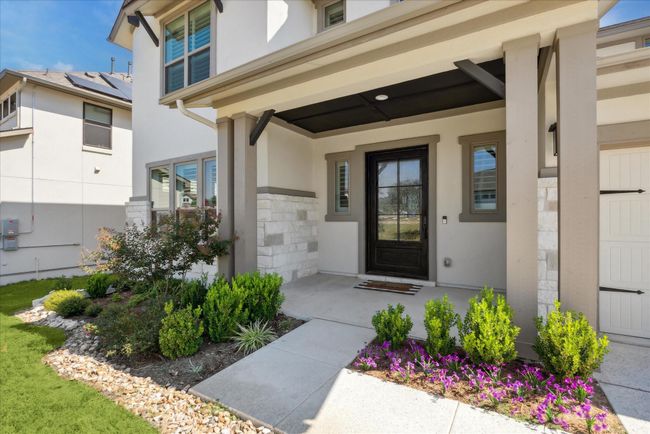 A 4ft wide covered front porch welcomes guests to your home. | Image 4