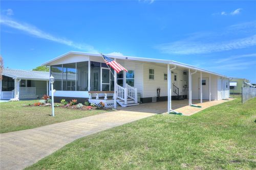948 Frangi Pani Dr, Barefoot Bay, FL, 32976-7128 | Card Image