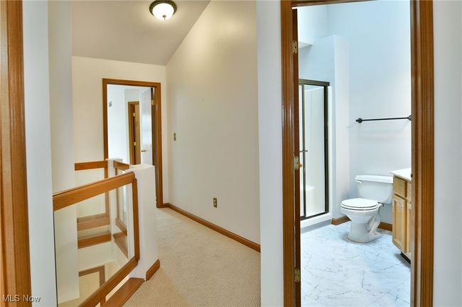 Corridor featuring an upstairs landing and light marble finish flooring | Image 27