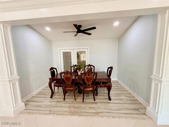 Dining area featuring recessed lighting, ceiling fan, french doors, and baseboards | Image 9