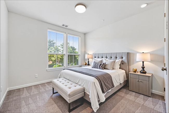 Bedroom with light carpet and baseboards. (Virtual Staging) | Image 10