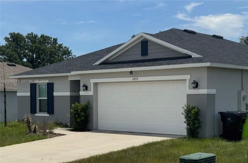 1459 Geranium Dr, Mascotte, FL, 34753-9583 | Card Image