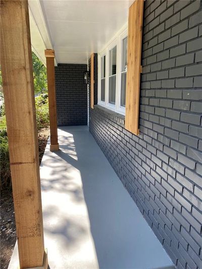 View of patio / terrace featuring a porch | Image 3