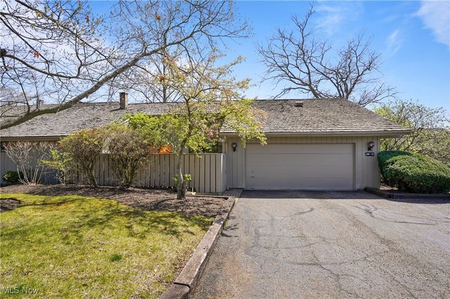 Single story home with fence, a front lawn, aphalt driveway, and a garage | Image 49