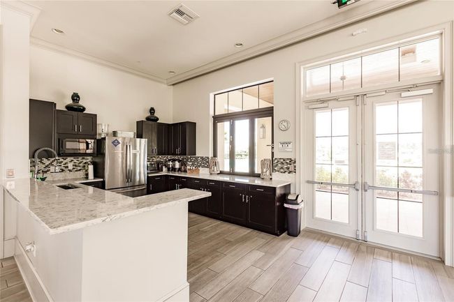 11560 Tapestry Ln, House other with 3 bedrooms, 3 bathrooms and null parking in Venice FL | Image 69