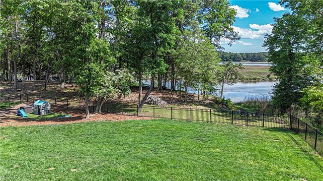 Irrigated backyard, with play area and premium fencing | Image 44