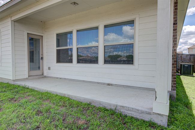 Property entrance featuring a patio and central AC unit | Image 26
