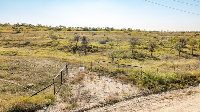 View of yard with fence and a rural view | Image 24