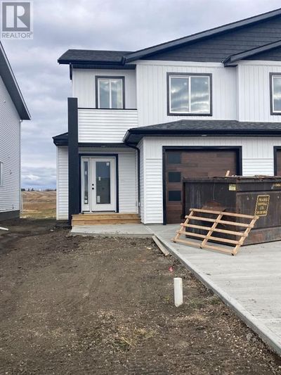 9510 114 Ave, Home with 3 bedrooms, 3 bathrooms and 2 parking in Clairmont AB | Image 1