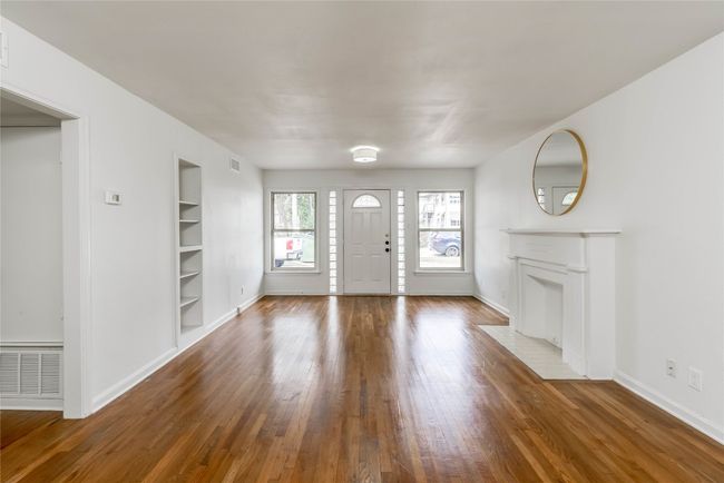 Entrance foyer with wood finished floors and baseboards | Image 28