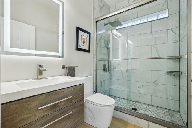 lower level full bathroom | Image 36