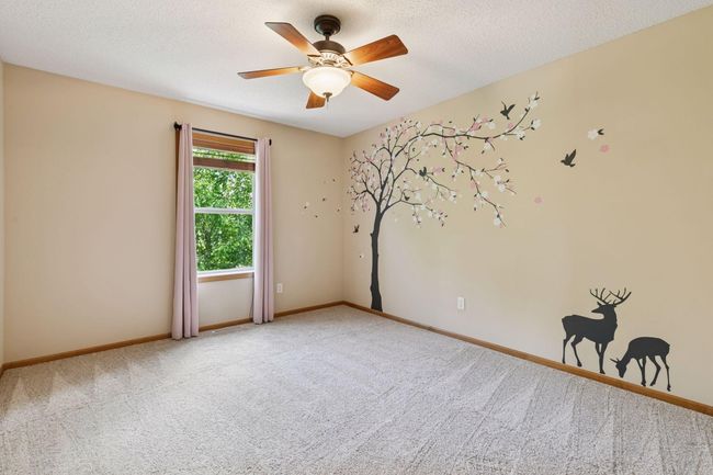 The second bedroom measures 13x11 and faces east | Image 15