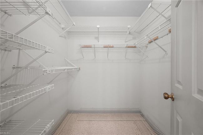 One of two walk in closets in Primary | Image 25
